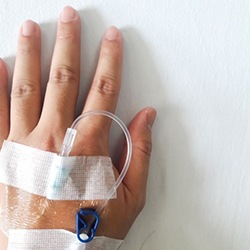 Close-up of IV in patient’s hand