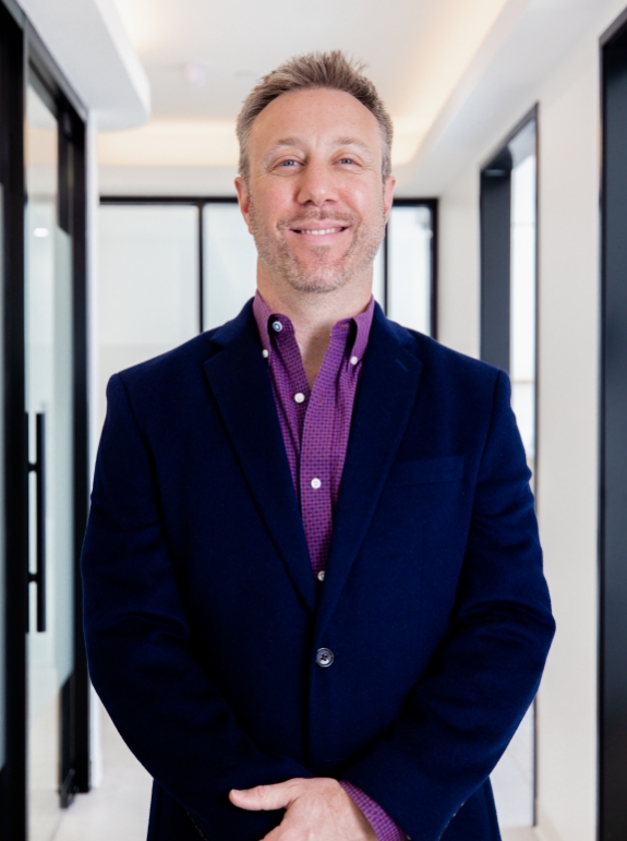 Dr. Adam Manfredo