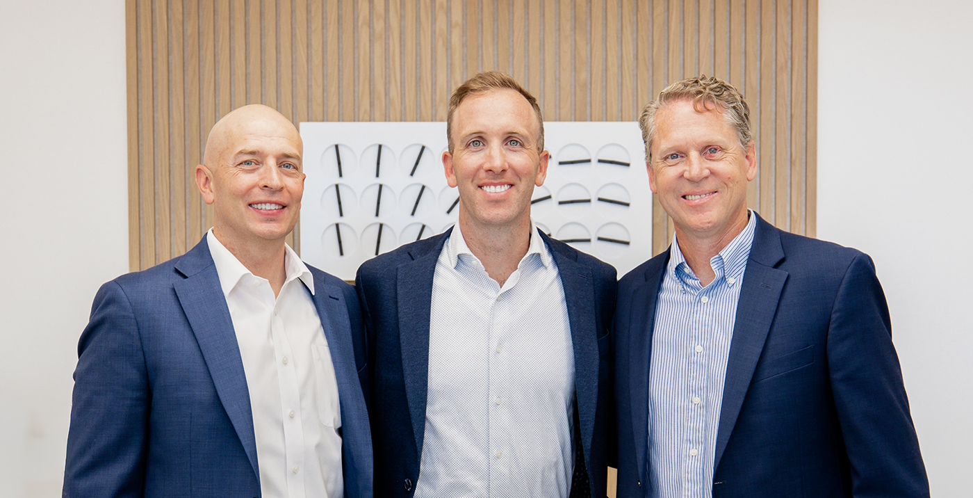 Dr. Ryan Mickle wearing magnifying glasses