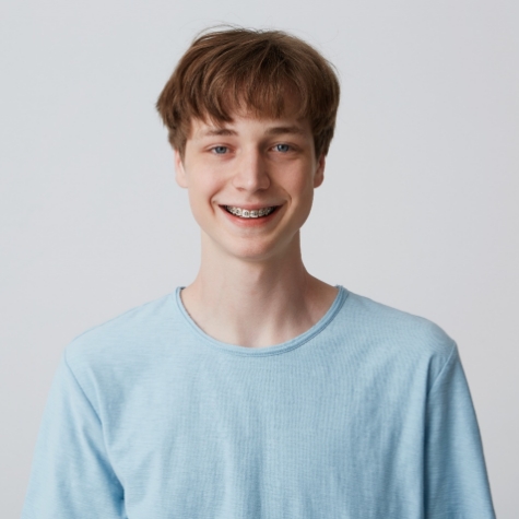Portrait of teen boy with braces