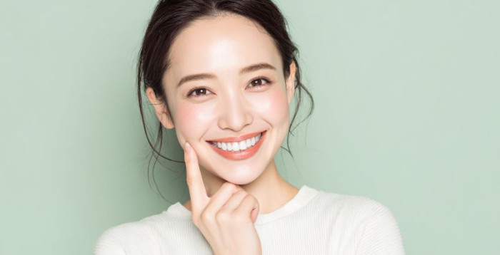 Portrait of smiling woman with beautiful, bright teeth