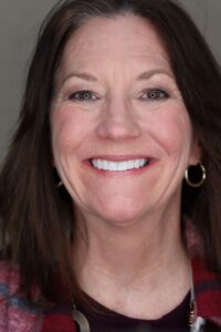 Portrait of smile middle-aged woman, a patient of Landmark Dental Studio